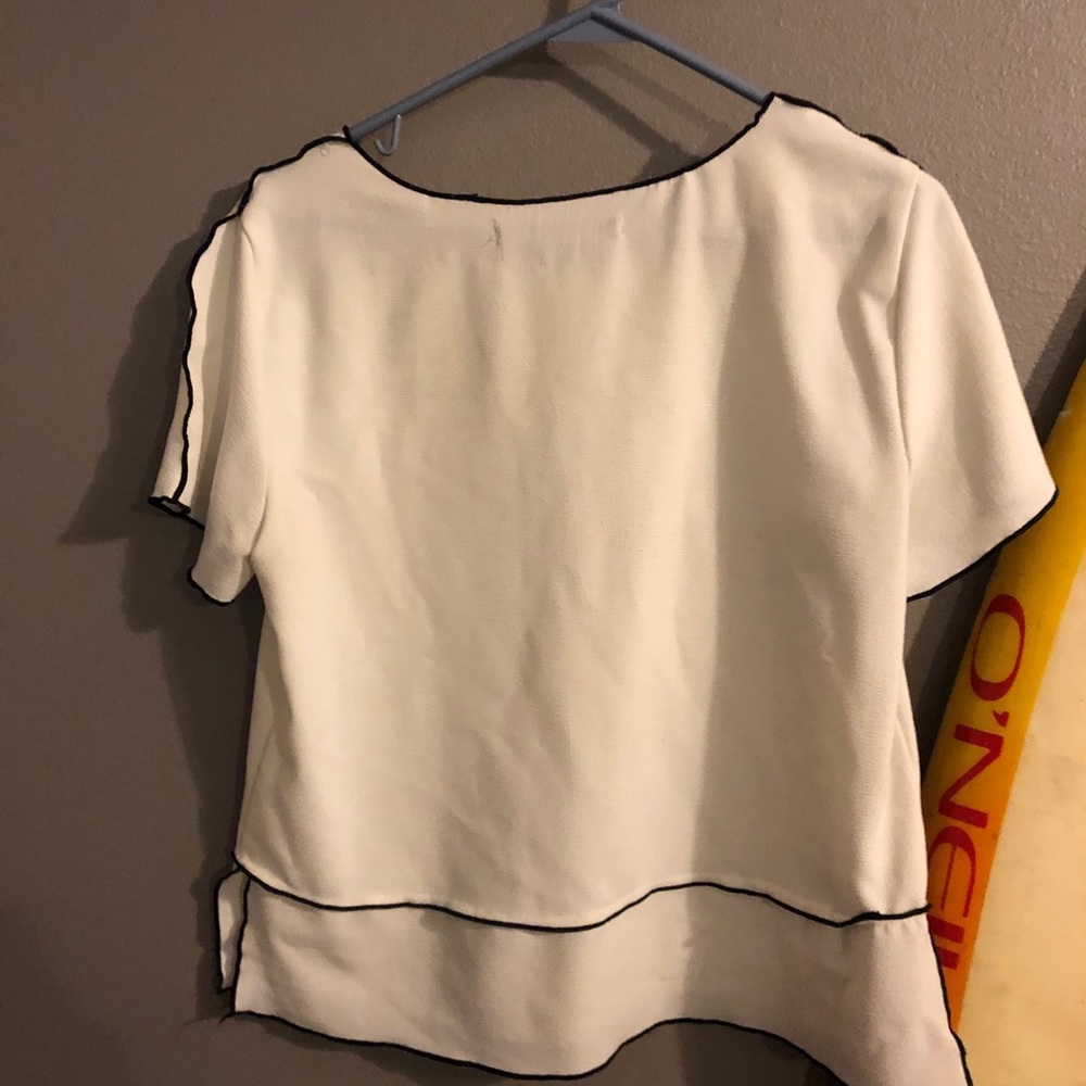 White and black blouse shirt